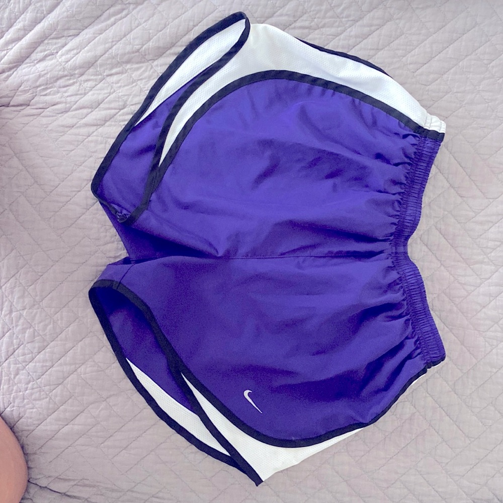 Nike dry tempo running shorts Color purple with white side and black trim Size 6